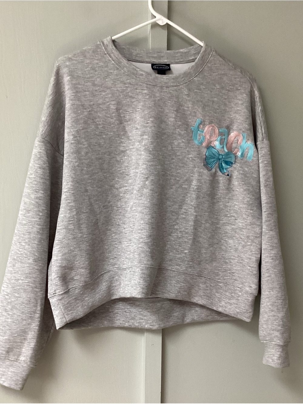 Scoop Light Gray Sweatshirt with Pastel Embroidered 'teach' and Blue Bow